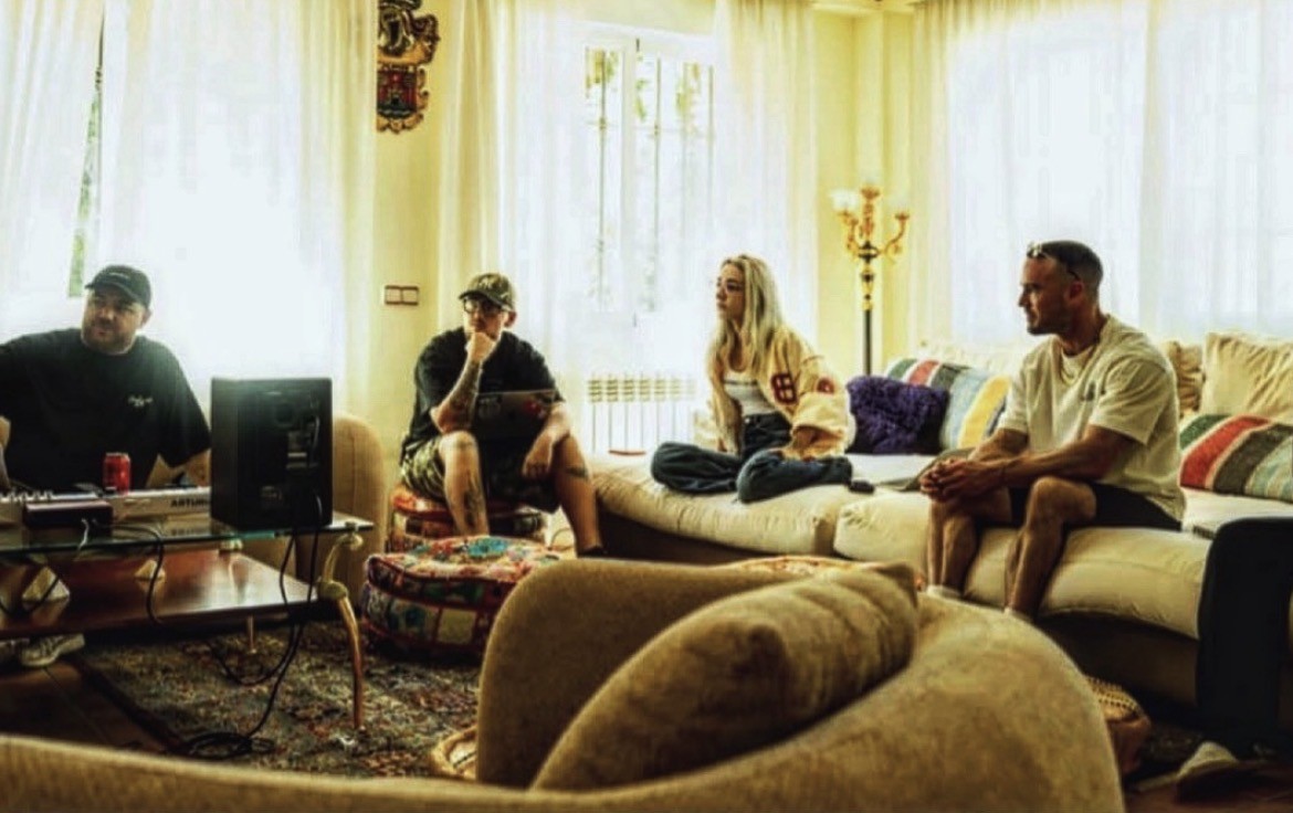 Guests learning together in the villa lounge