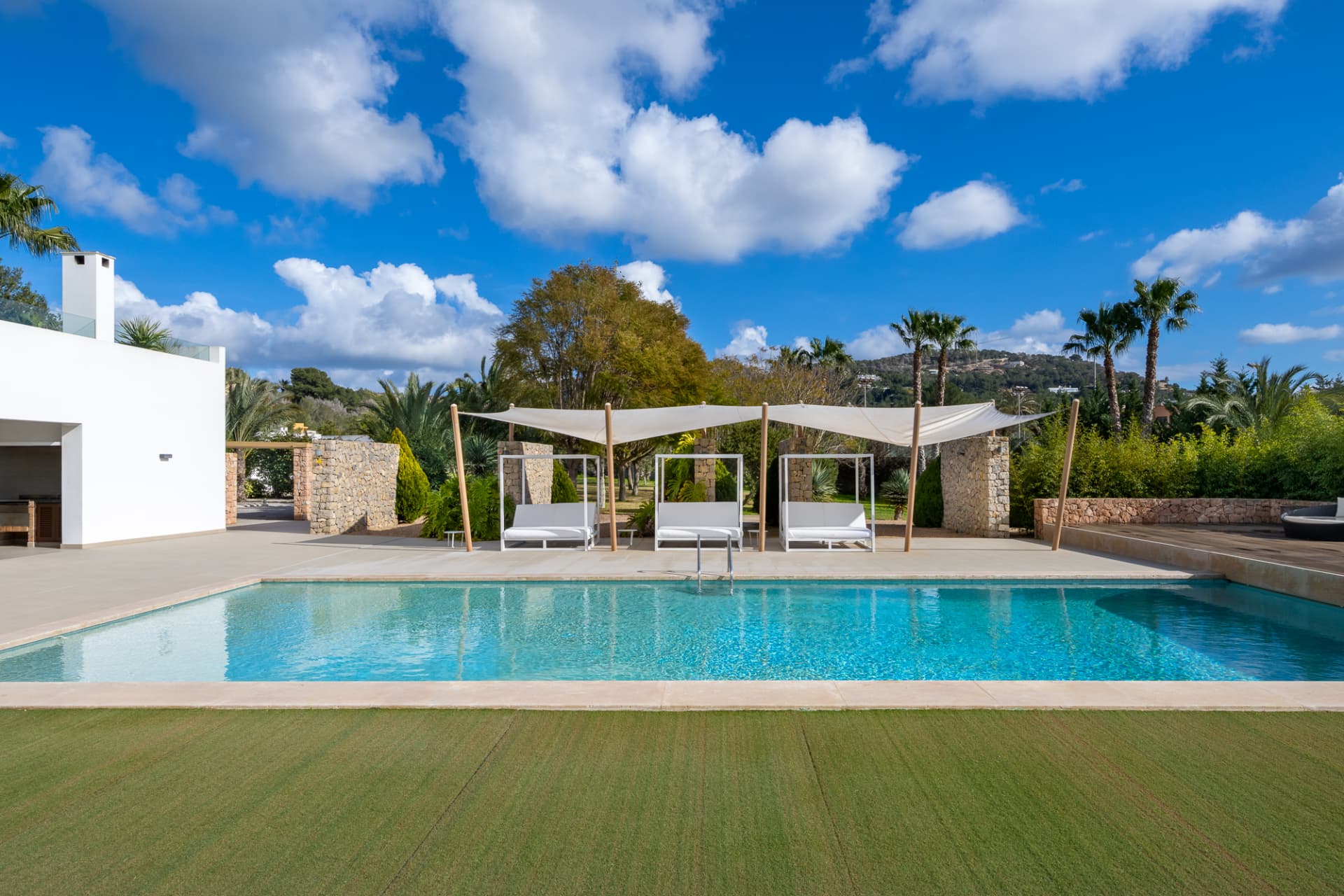 The pool and sunbeds